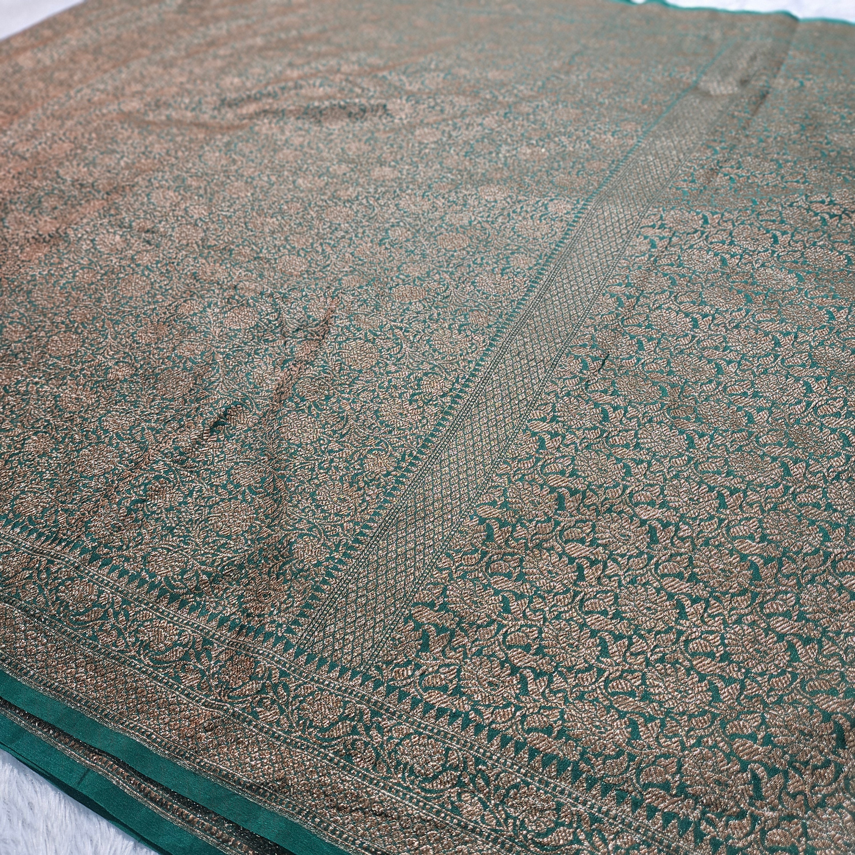 Bottle Green Banarasi Georgette Saree with Antique Zari Tanchui Design