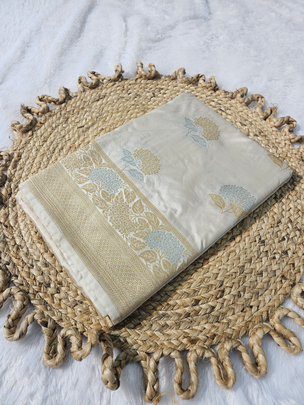 Cream Raw Mango Silk Saree with a beautiful Buta Design